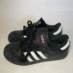 Black adidas sambas grade school